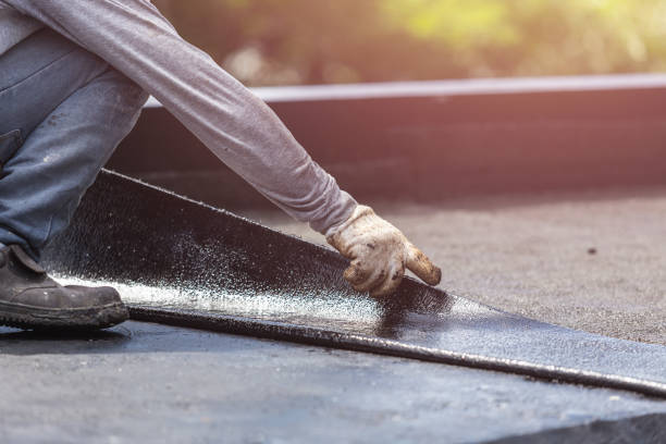 Professional Basement Waterproofing technician working in Harrison, OH